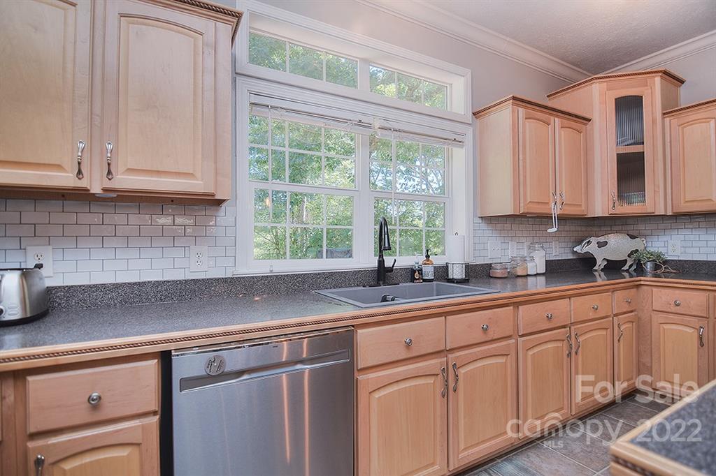 130 Printhad Road Dallas, NC 28034 - Photo 13 of 43 a kitchen with sink cabinets and window