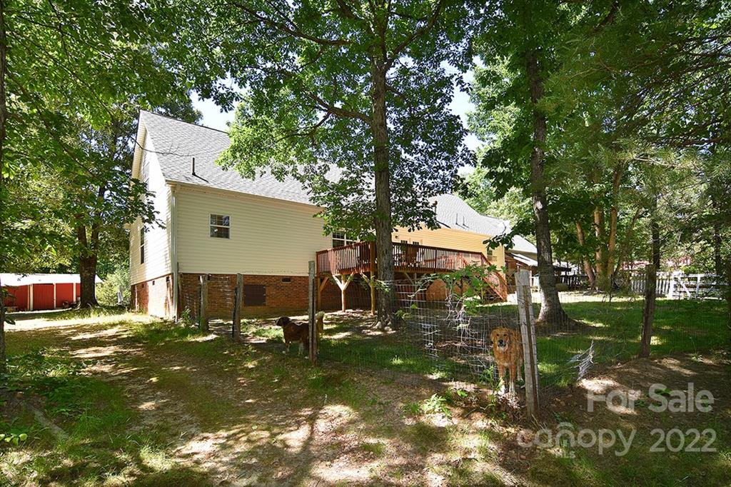 130 Printhad Road Dallas, NC 28034 - Photo 36 of 43 a view of a house with backyard