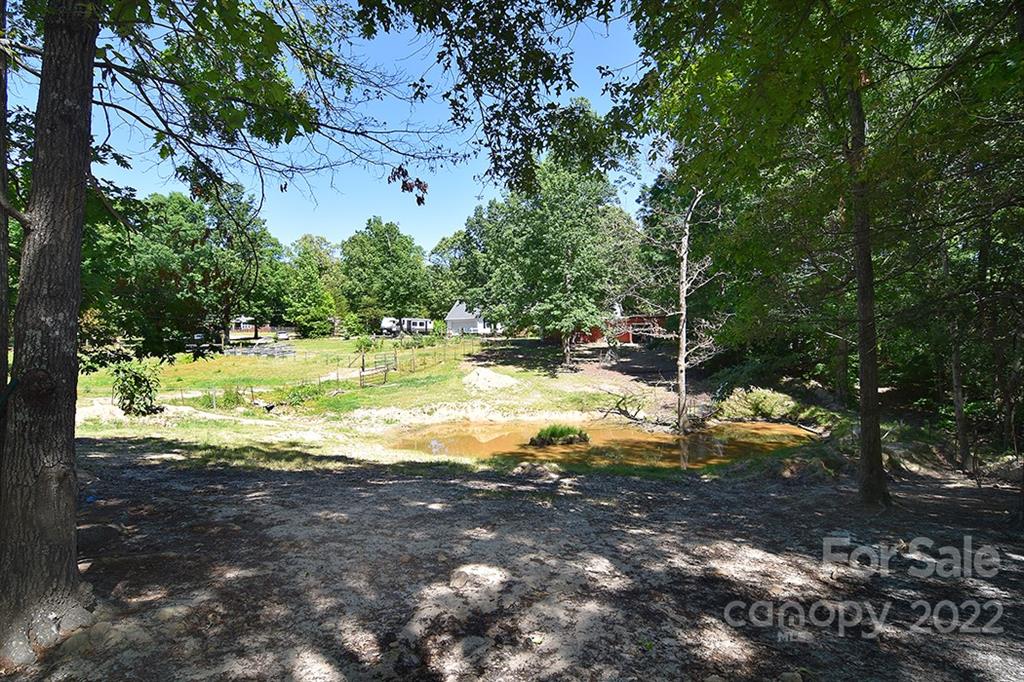 130 Printhad Road Dallas, NC 28034 - Photo 38 of 43 a view of a yard with swimming pool