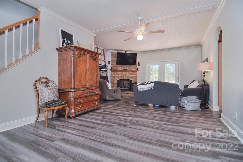 130 Printhad Road Dallas, NC 28034 - Photo 6 of 43 a living room with furniture and a fireplace