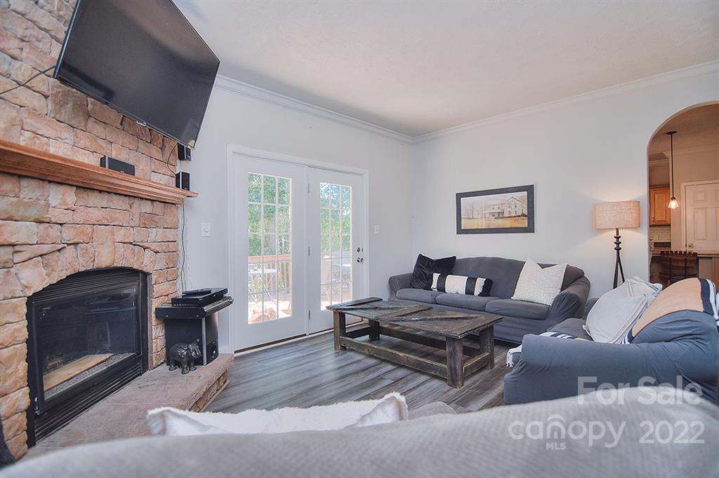 130 Printhad Road Dallas, NC 28034 - Photo 10 of 43 a living room with furniture and a fireplace