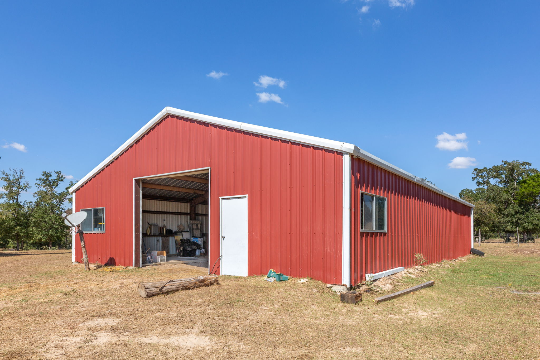 274 Old Potato Road Paige, TX 78659 - Photo 21 of 39 View of pole building featuring a yard
