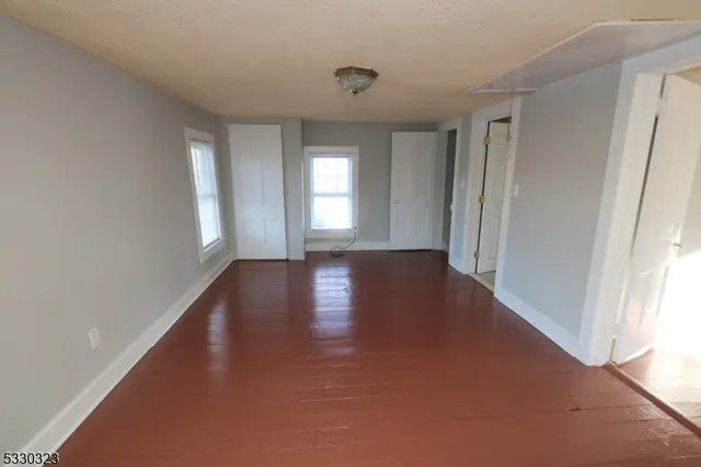 a view of livingroom with hardwood floor and window