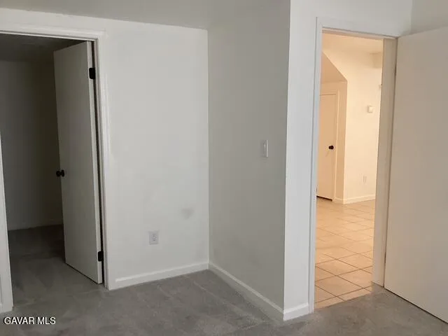 a view of a bathroom with a glass door