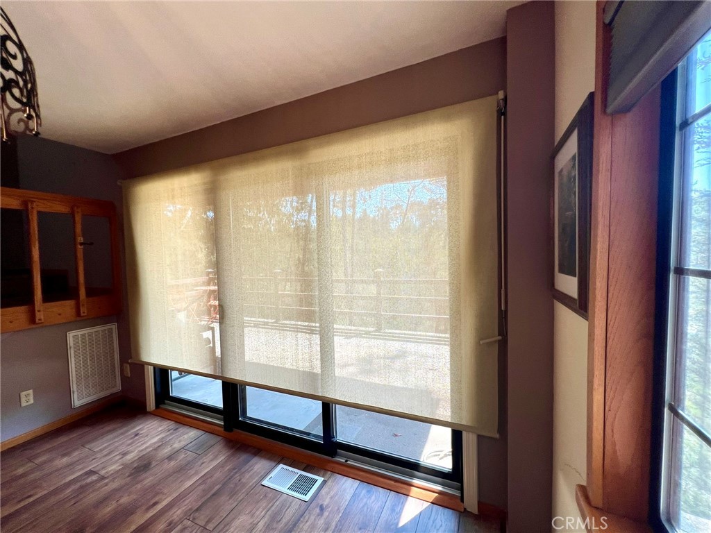 3151 Ramsey Road Cambria, CA 93428 - Photo 17 of 46 Living room sliding door shade
