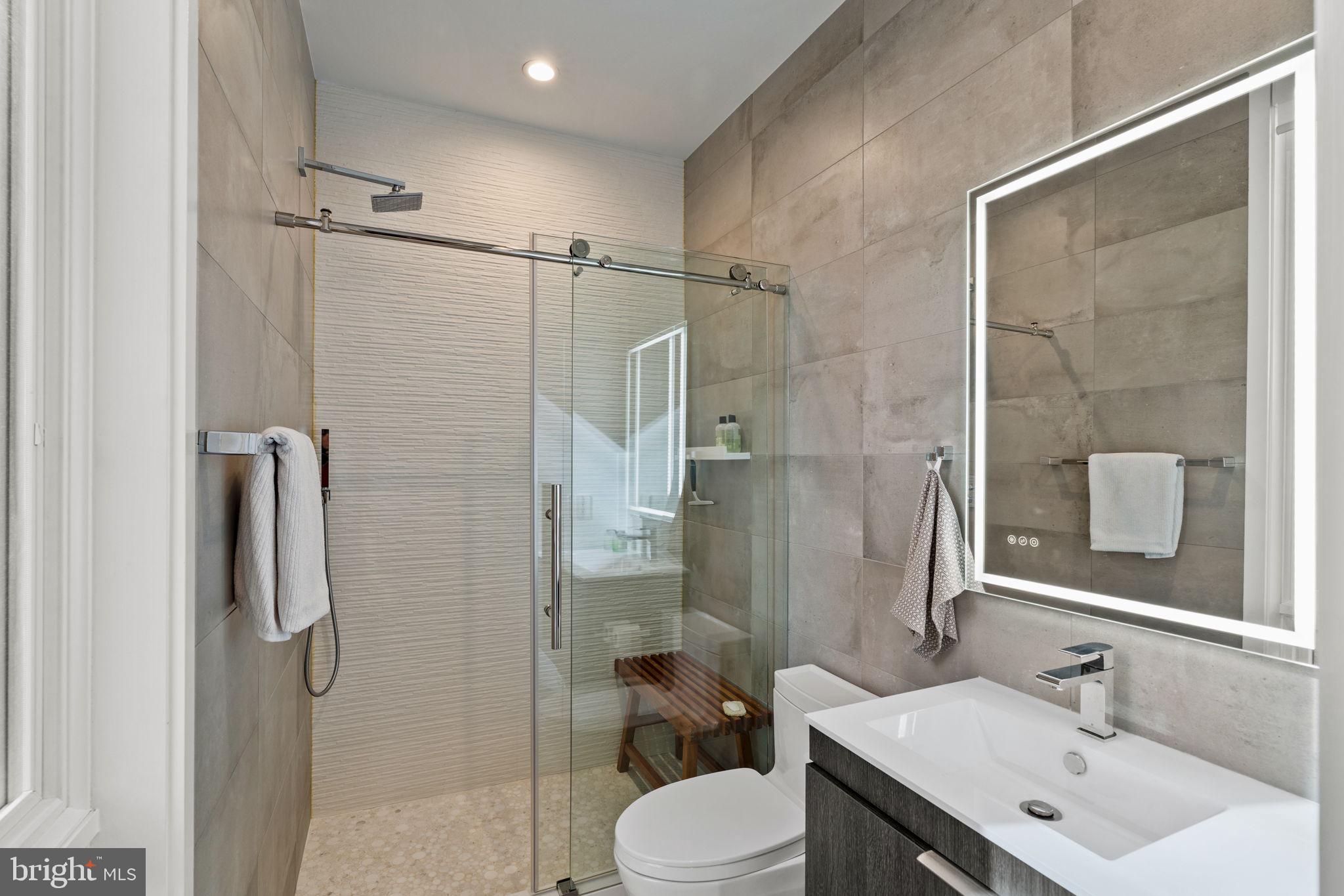1646 Carlton Street Philadelphia, PA 19103 - Photo 29 of 66 a bathroom with a sink toilet and shower