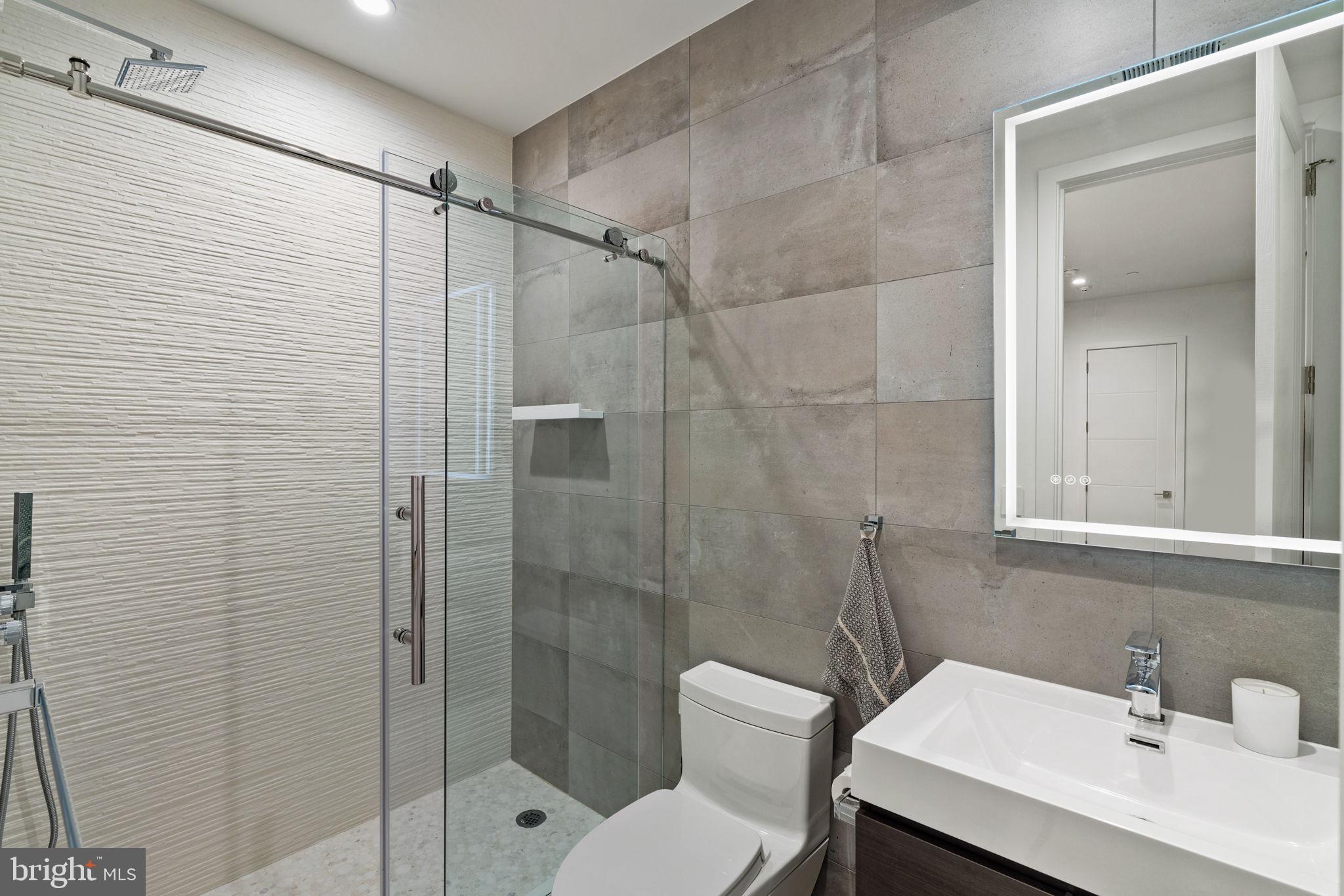 1646 Carlton Street Philadelphia, PA 19103 - Photo 56 of 66 a bathroom with a sink toilet and shower