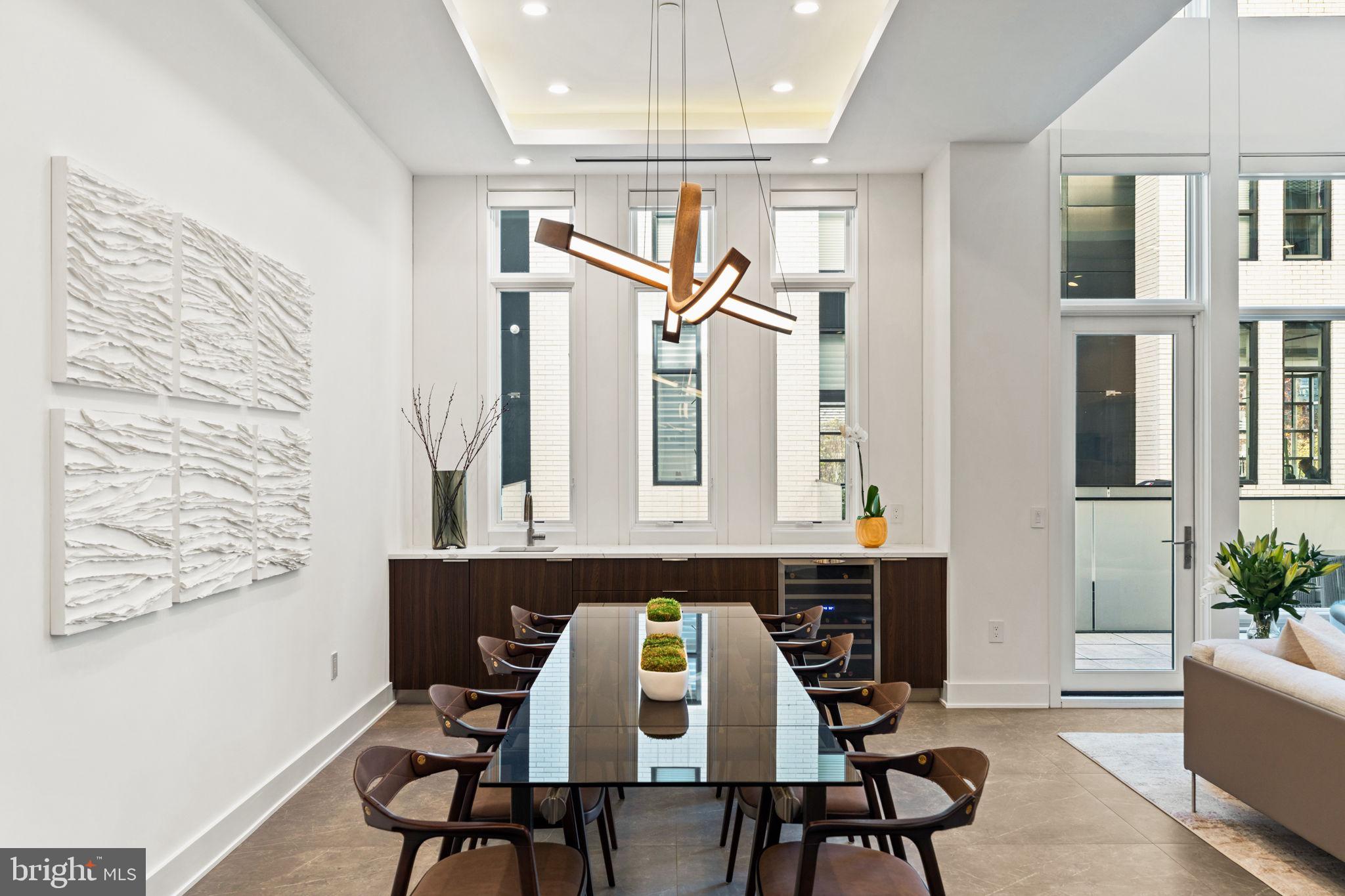 1646 Carlton Street Philadelphia, PA 19103 - Photo 9 of 66 a view of a dining room with furniture and chandelier