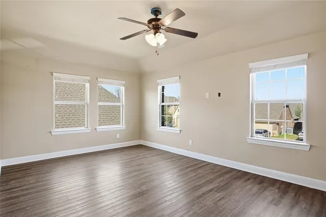 a view of a bathroom from a hallway