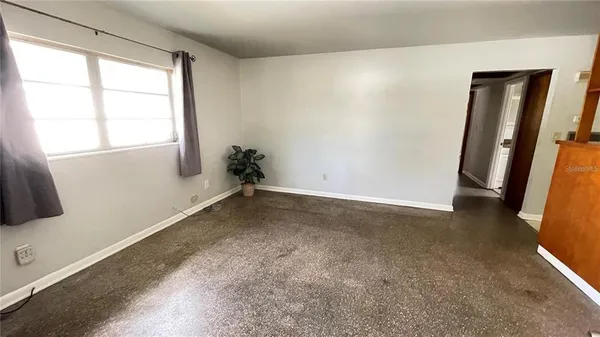 an empty room with a window