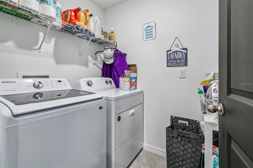 3139 Silver Date Drive Wimauma, FL 33598 - Photo 15 of 47 a utility room with dryer and washer