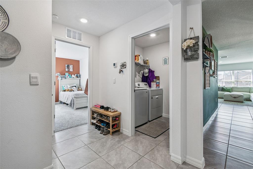 3139 Silver Date Drive Wimauma, FL 33598 - Photo 23 of 47 a living room with furniture and a dining table