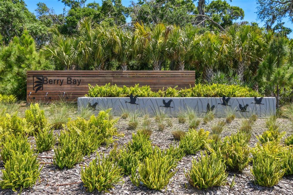 3139 Silver Date Drive Wimauma, FL 33598 - Photo 35 of 47 a view of a garden with a bench in the garden