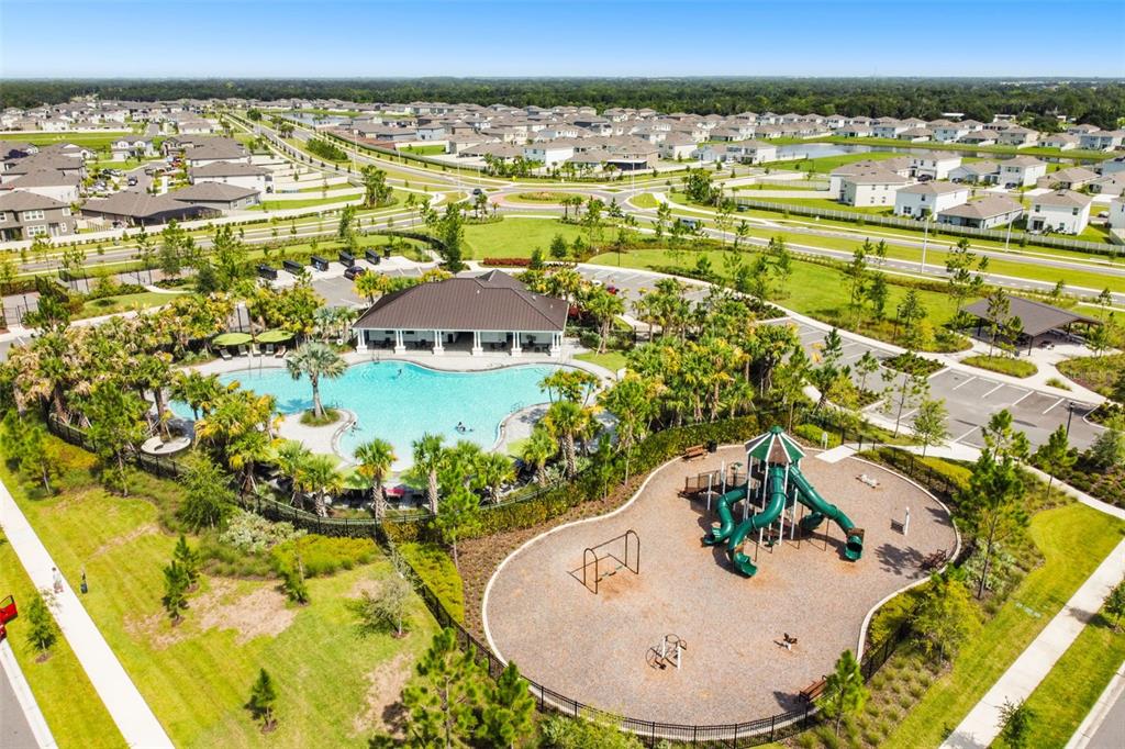 3139 Silver Date Drive Wimauma, FL 33598 - Photo 39 of 47 an aerial view of residential houses with outdoor space