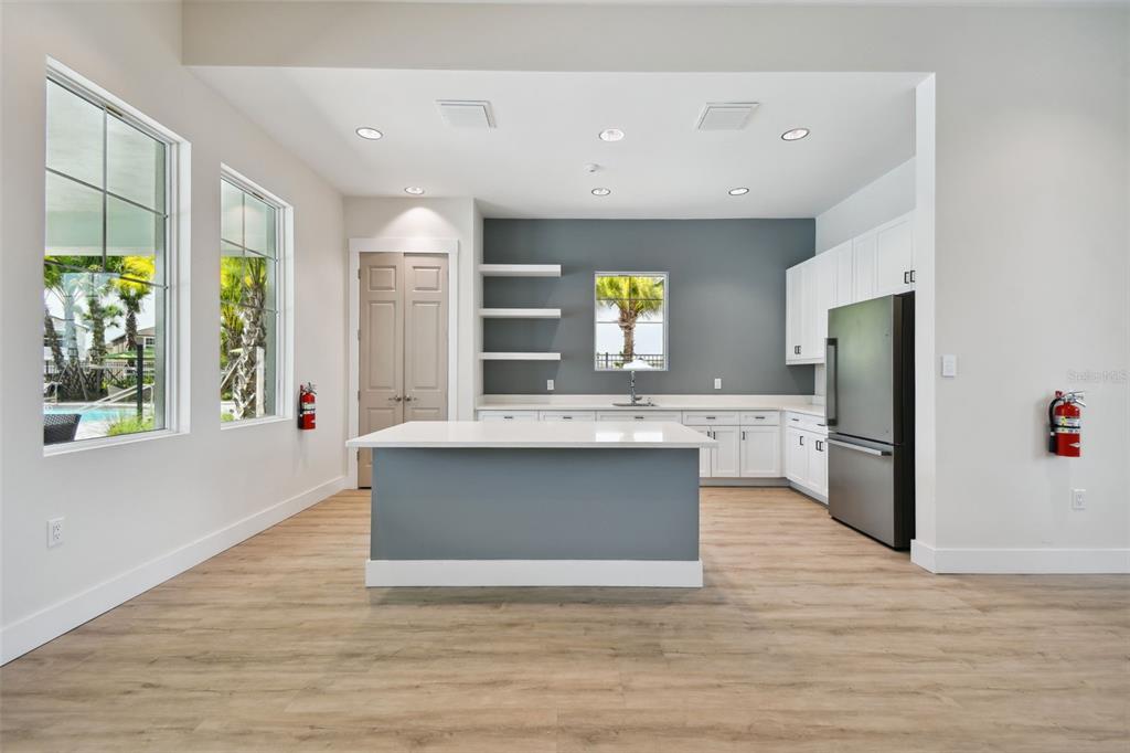 3139 Silver Date Drive Wimauma, FL 33598 - Photo 41 of 47 a view of kitchen with granite countertop cabinets and window
