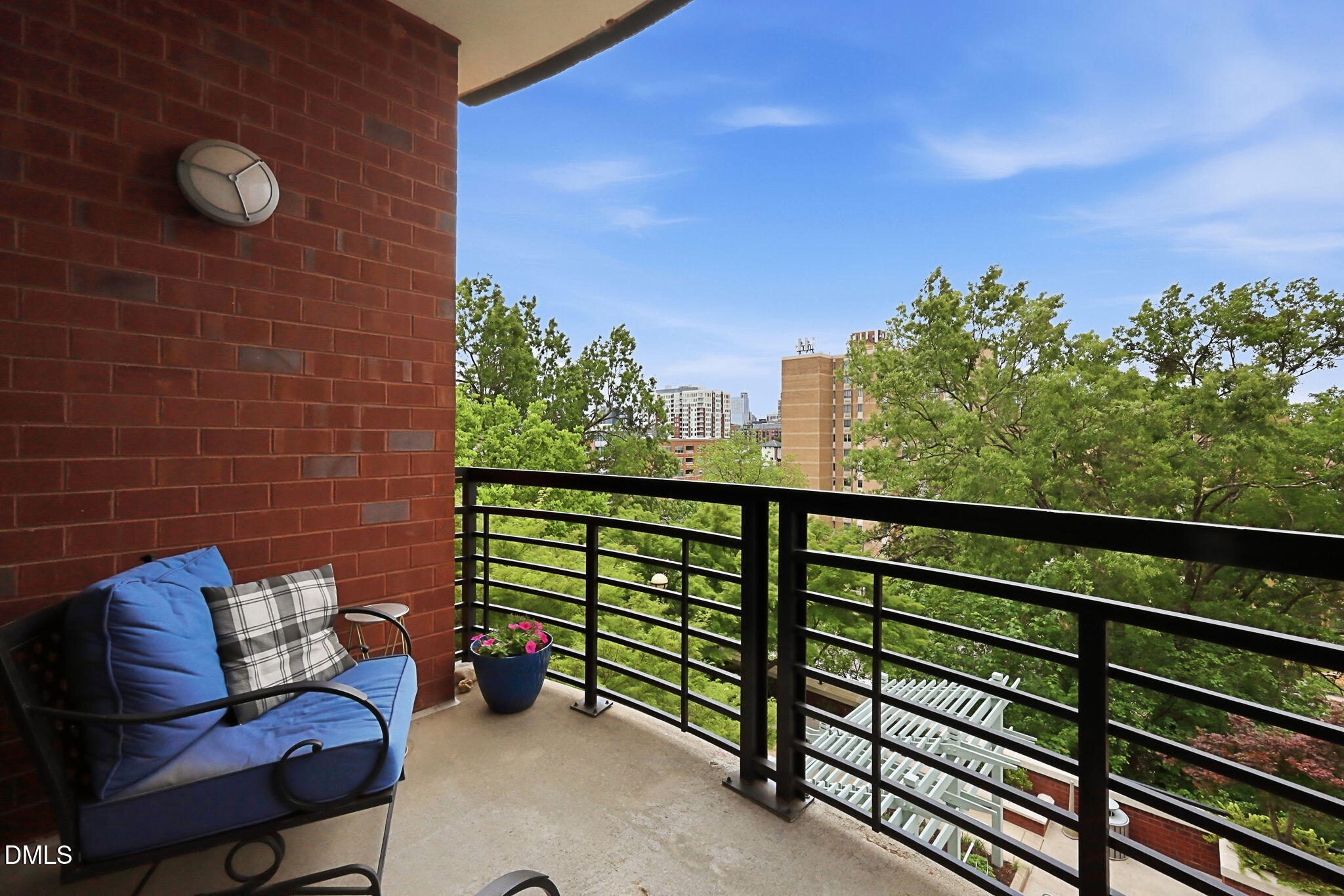 618 North Boylan Avenue, Unit 718 Raleigh, NC 27603 - Photo 22 of 38 a view of a chairs in a balcony