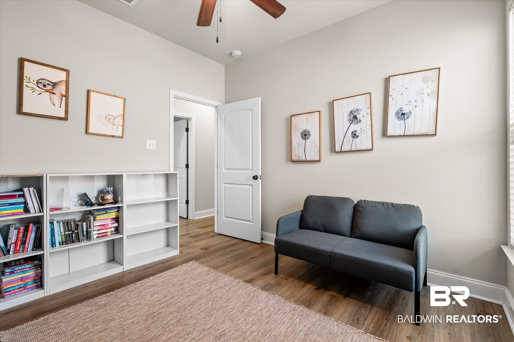 1116 Stella Road Foley, AL 36535 - Photo 20 of 29 Living area with hardwood / wood-style flooring and ceiling fan
