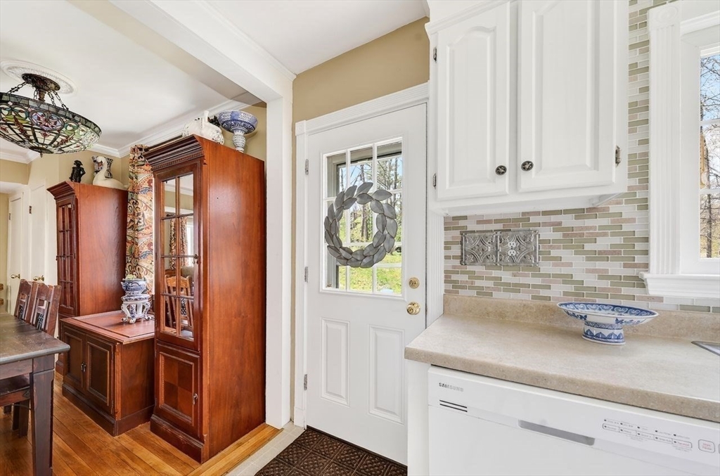 15 Leigh Road Norwell, MA 02061 - Photo 14 of 34 a kitchen with a refrigerator and a sink