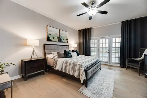 a living room with furniture a window and kitchen view