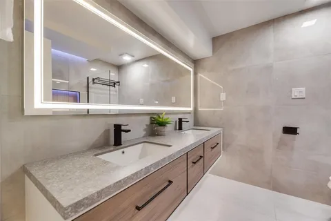 a view of entryway with cabinets