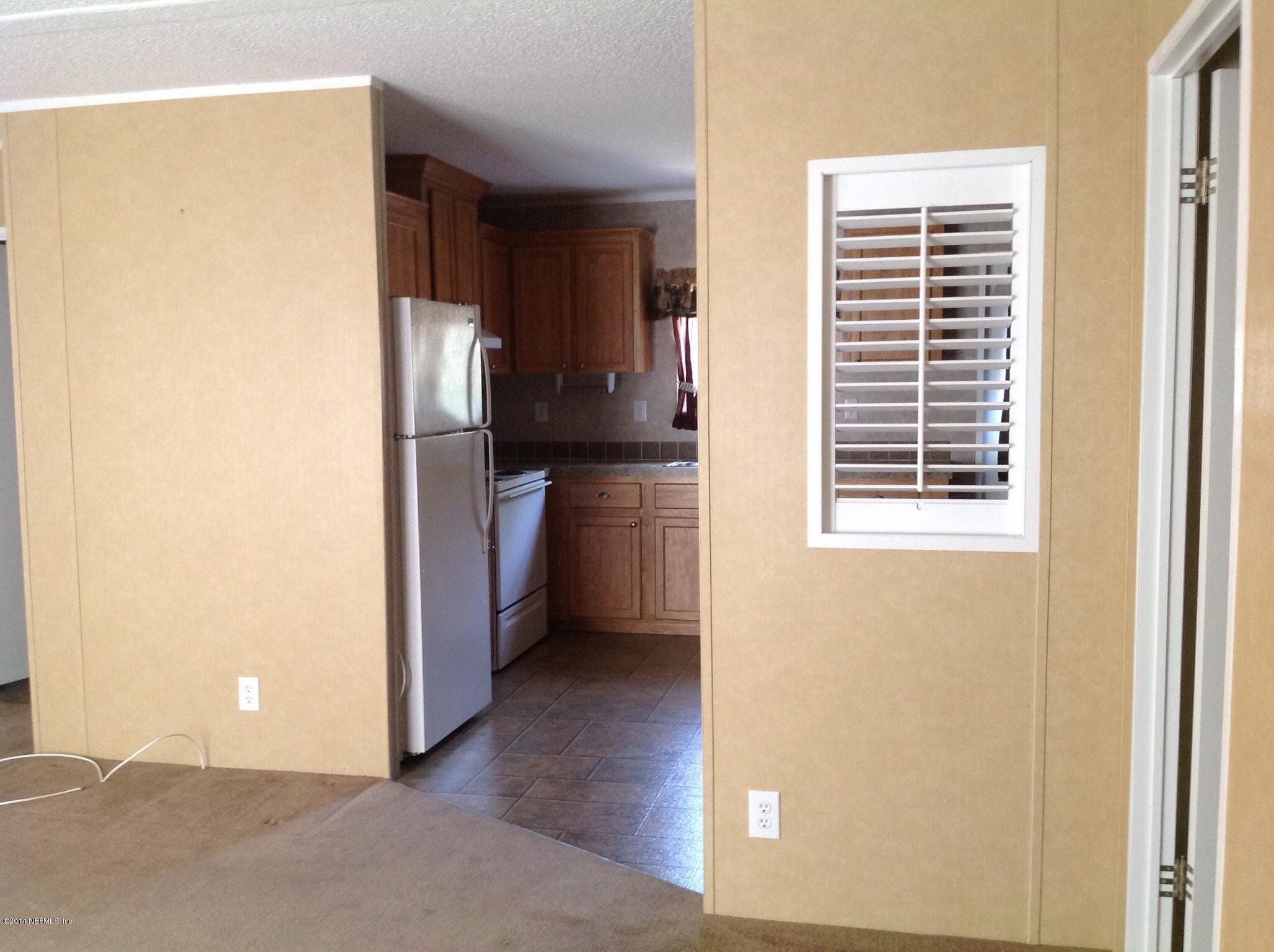 111 Stallion Road Crescent City, FL 32112 - Photo 16 of 21 Into kitchen