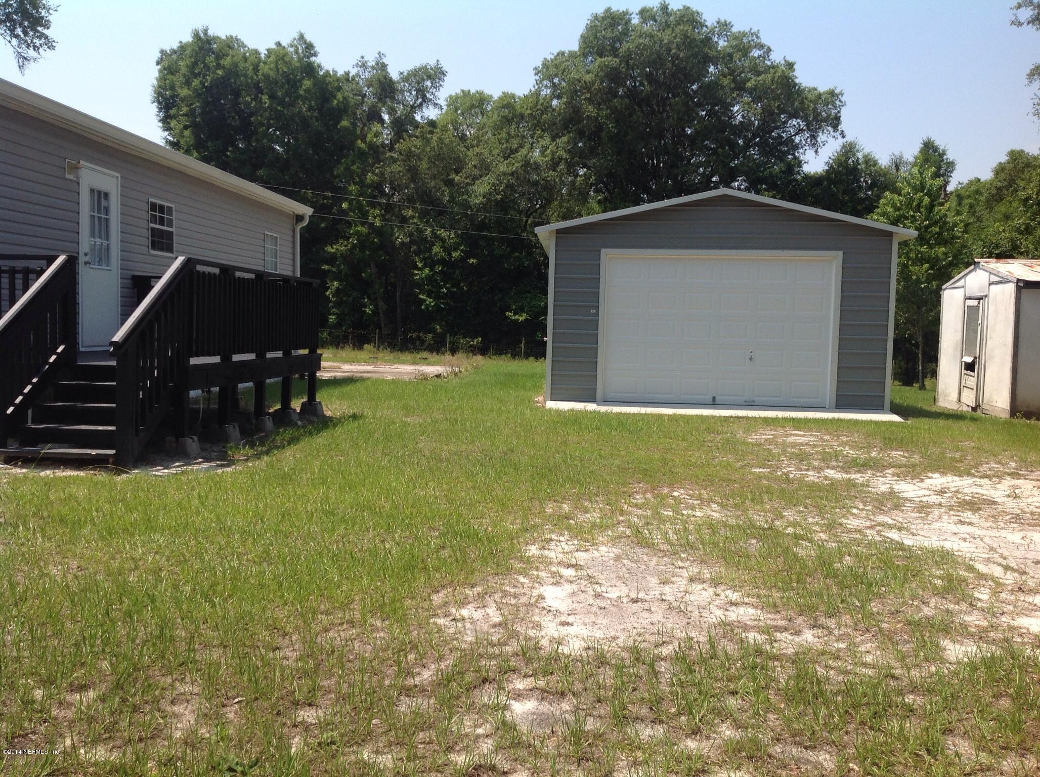 111 Stallion Road Crescent City, FL 32112 - Photo 10 of 21 Garage & back deck