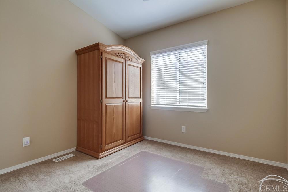 8545 Mission Gorge Road, Unit SPC 232 Santee, CA 92071 - Photo 17 of 30 an empty room with windows