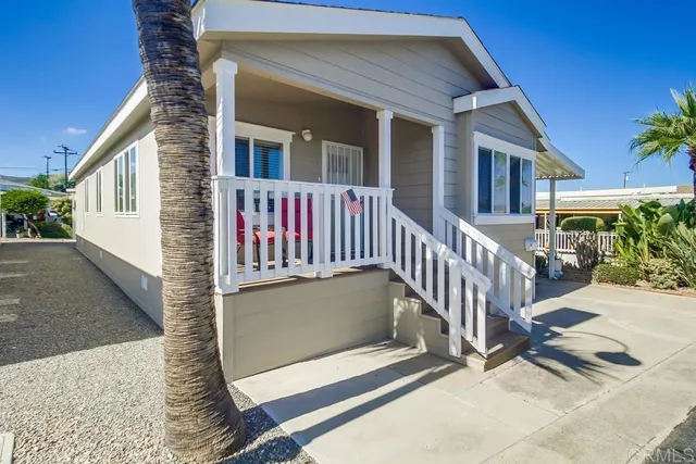 a view of backyard with deck and wooden floor