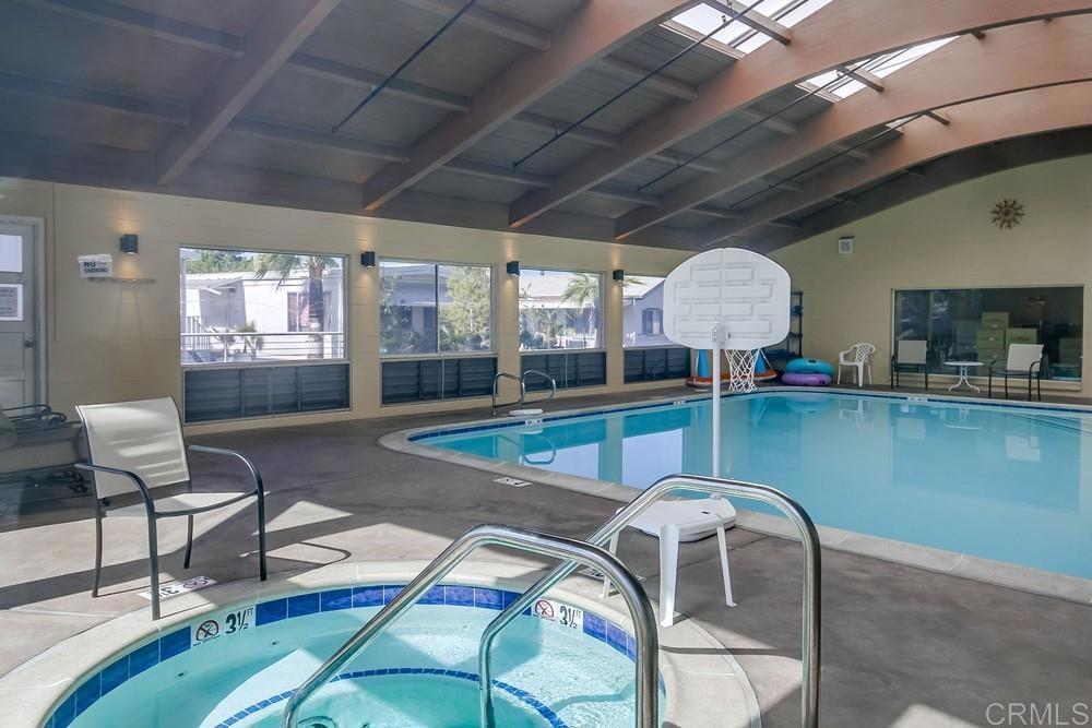8545 Mission Gorge Road, Unit SPC 232 Santee, CA 92071 - Photo 30 of 30 a room with lots of chairs and pool table