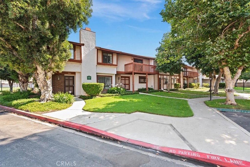 5223 Hanover Way Montclair, CA 91763 - Photo 1 of 1 a house with green field in front of it