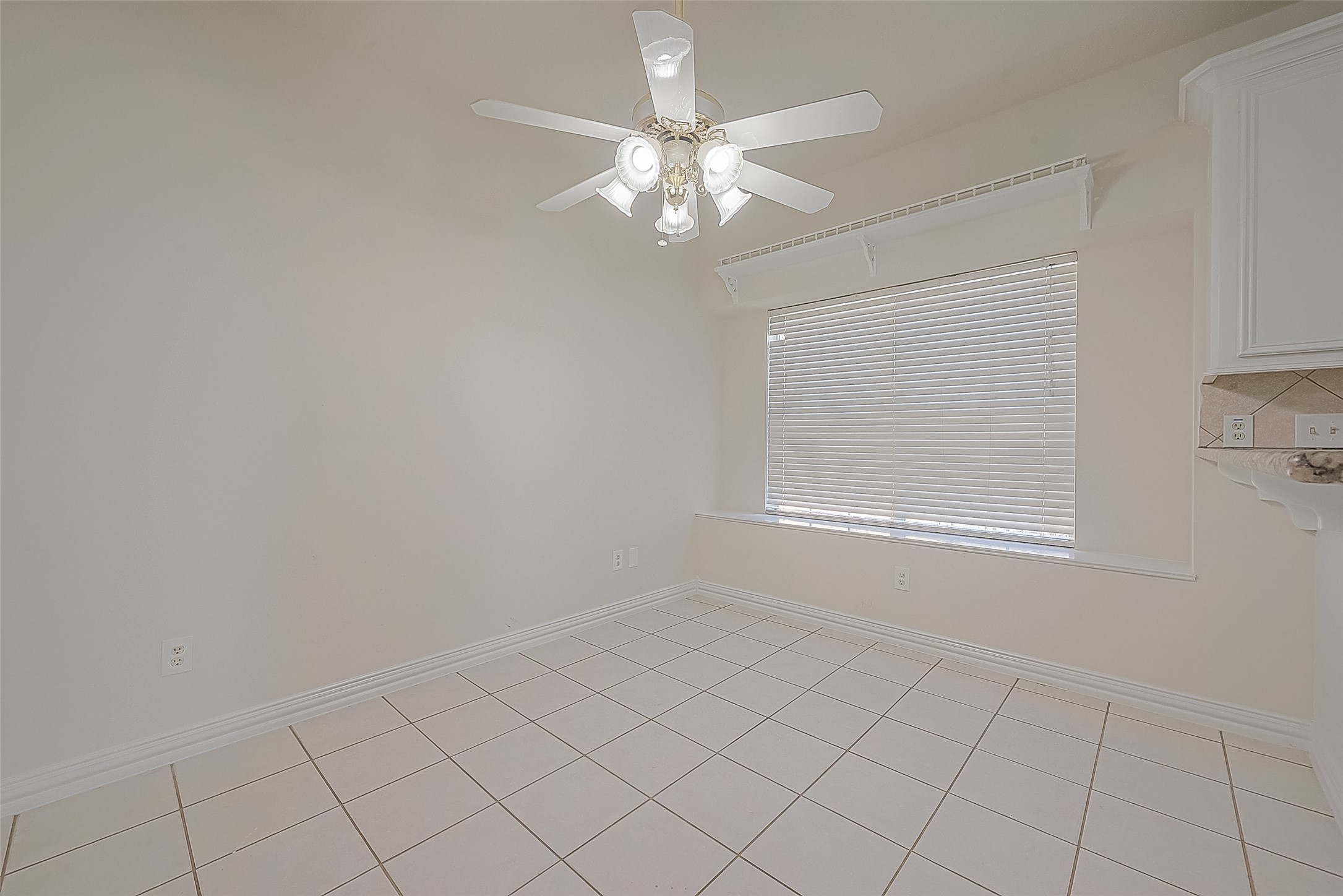 1189 Lovett Street Tomball, TX 77375 - Photo 17 of 36 a view of an empty room with a window