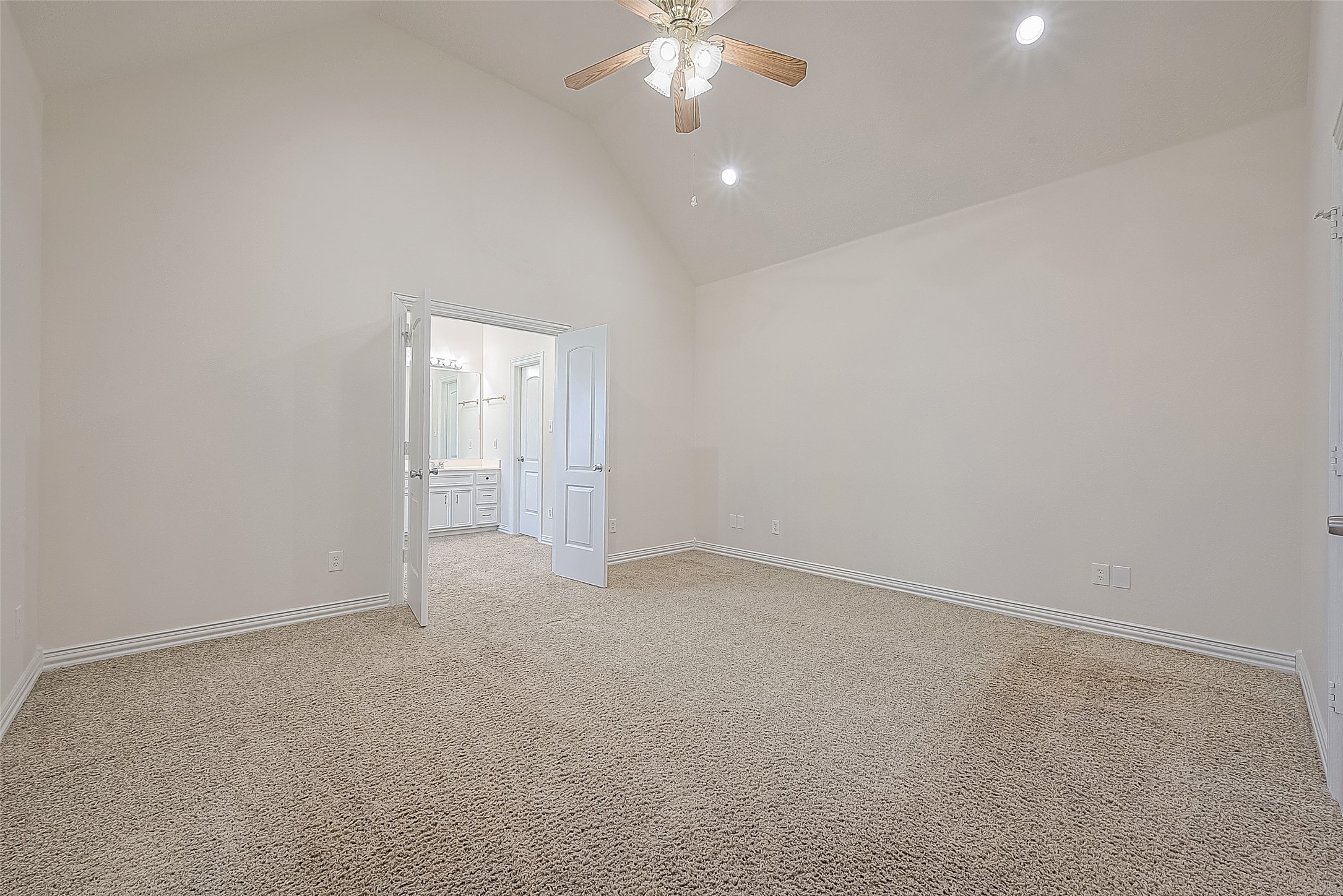1189 Lovett Street Tomball, TX 77375 - Photo 24 of 36 a view of an empty room with a chandelier fan
