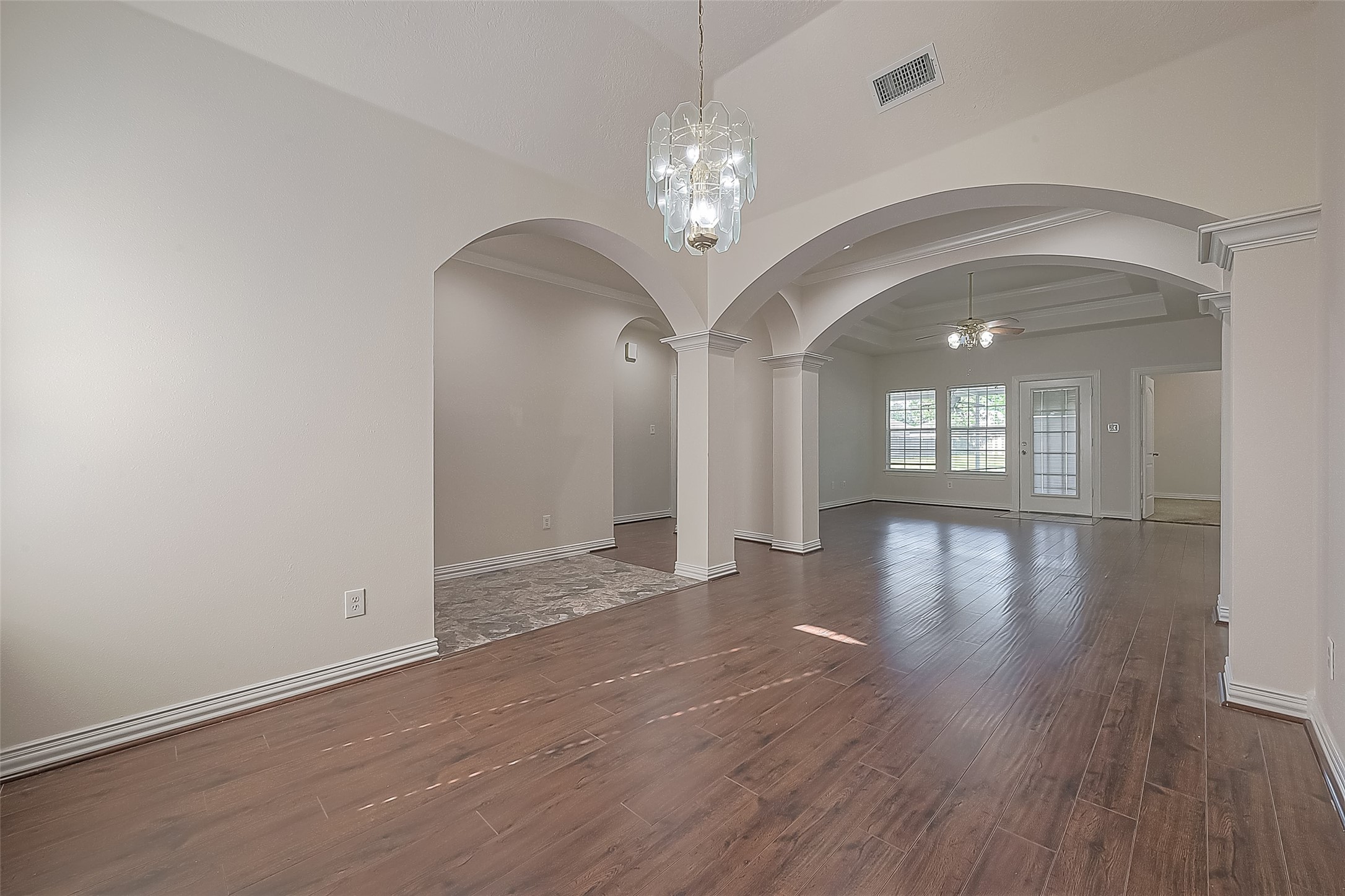 1189 Lovett Street Tomball, TX 77375 - Photo 5 of 36 wooden floor in an empty room with a window