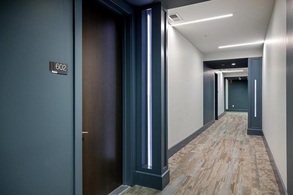 775 Juniper Street Northeast, Unit 602 Atlanta, GA 30308 - Photo 7 of 40 a view of hallway with wooden floor