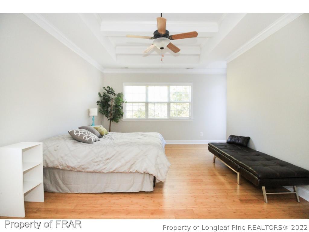 384 Booth Pond Road Raeford, NC 28376 - Photo 15 of 35 a bedroom with a bed and window