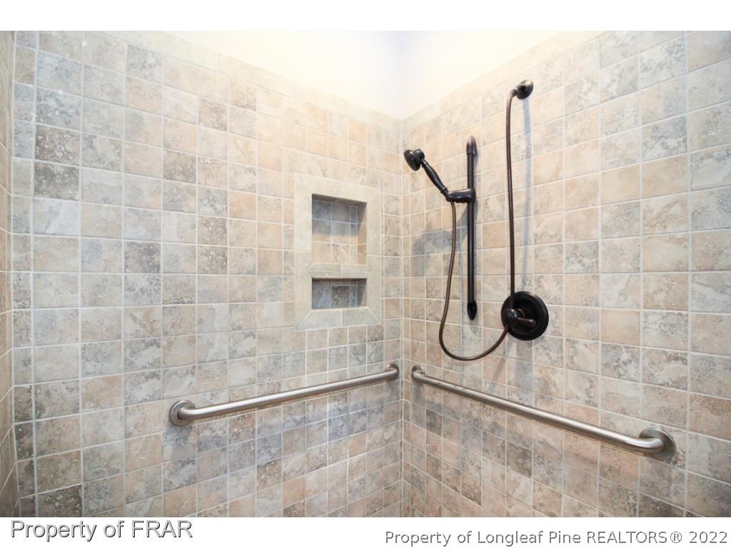 384 Booth Pond Road Raeford, NC 28376 - Photo 22 of 35 a bathroom with a shower