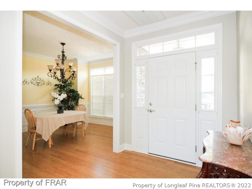 384 Booth Pond Road Raeford, NC 28376 - Photo 3 of 35 a view of a room with wooden floor