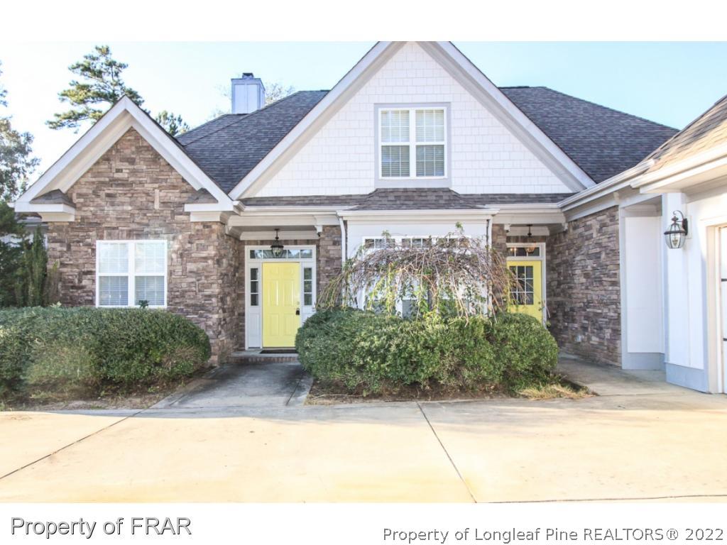 384 Booth Pond Road Raeford, NC 28376 - Photo 35 of 35 a front view of a house with garden