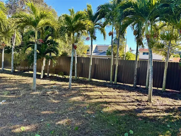 a view of a backyard of a house