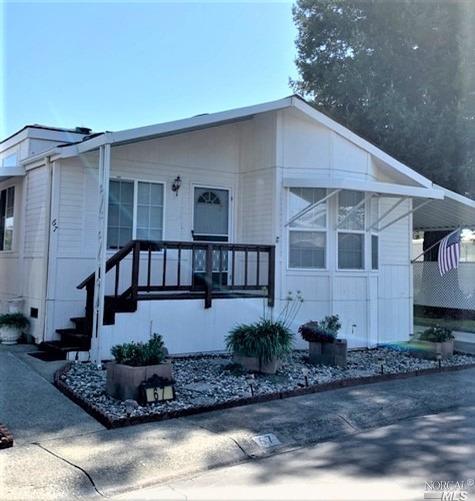 67 Shamrock Circle, Unit 67 Santa Rosa, CA 95403 - Photo 1 of 1 a front view of a house with garden