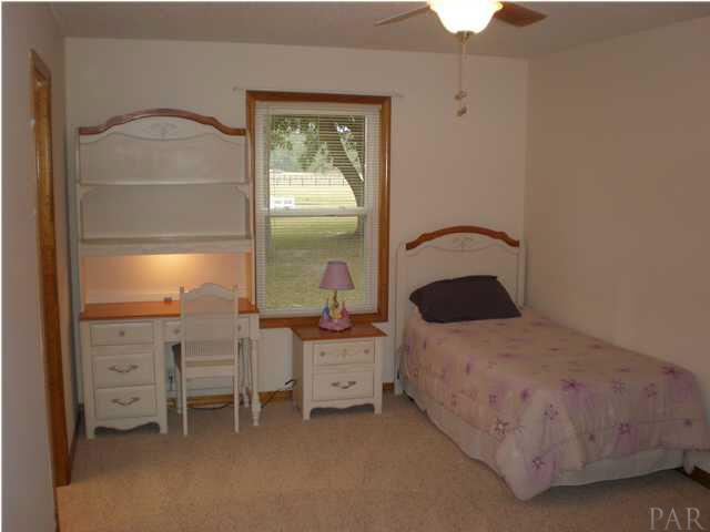 5170 Annie Ruth Street Milton, FL 32570 - Photo 12 of 24 Main House Bedroom #3 has Huge Walk-in Closet