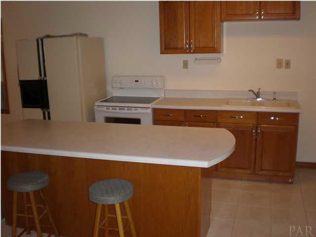 5170 Annie Ruth Street Milton, FL 32570 - Photo 14 of 24 Guest House Kitchen comes with Stove, Refrigerator and Breakfast Bar