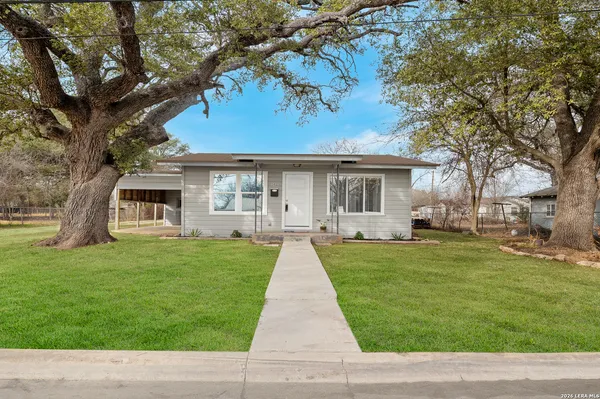 a house view with a garden space