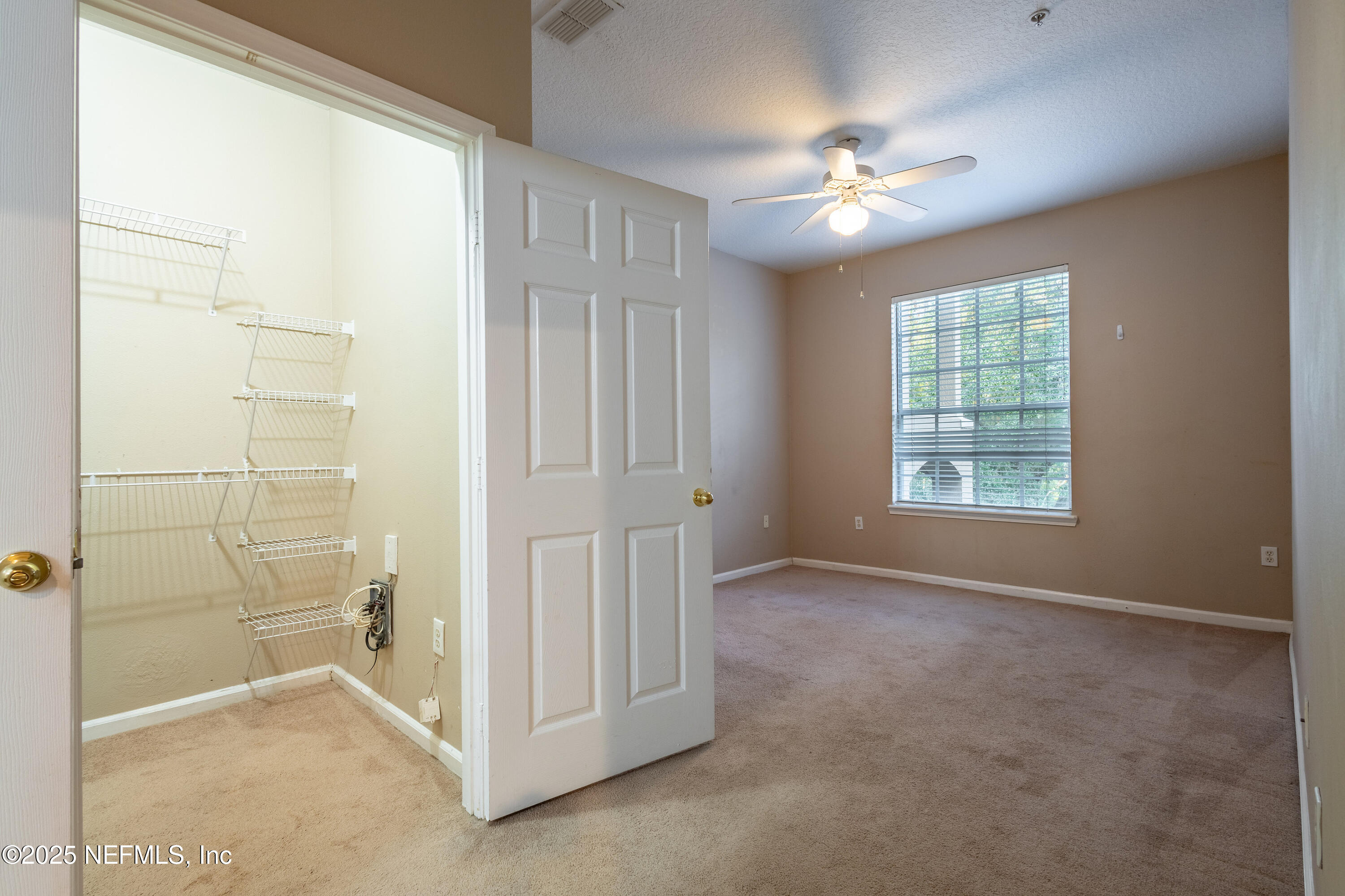 10550 Baymeadows Road, Unit 610 Jacksonville, FL 32256 - Photo 13 of 35 a view of an empty room with a window