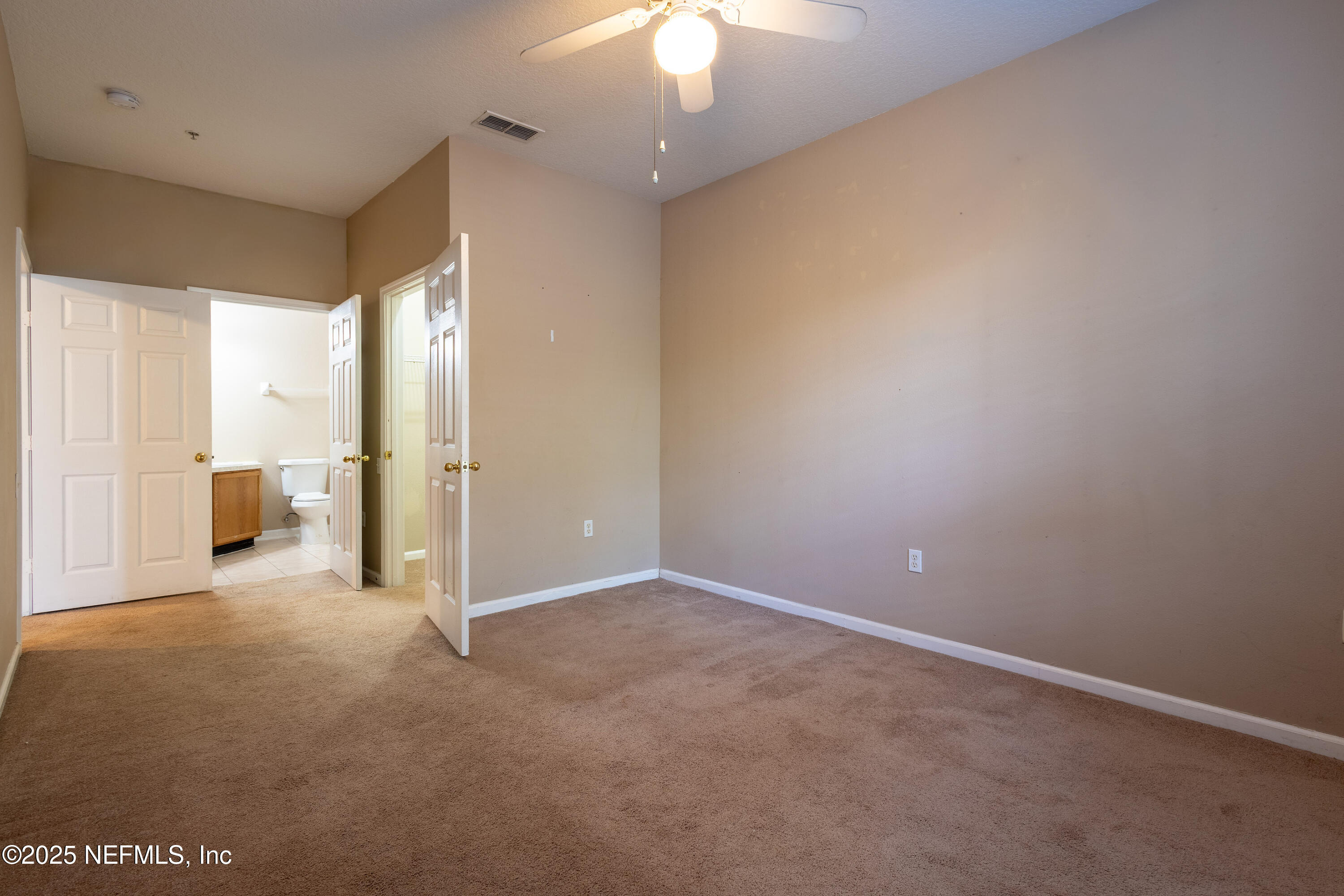 10550 Baymeadows Road, Unit 610 Jacksonville, FL 32256 - Photo 14 of 35 an empty room with a bathroom