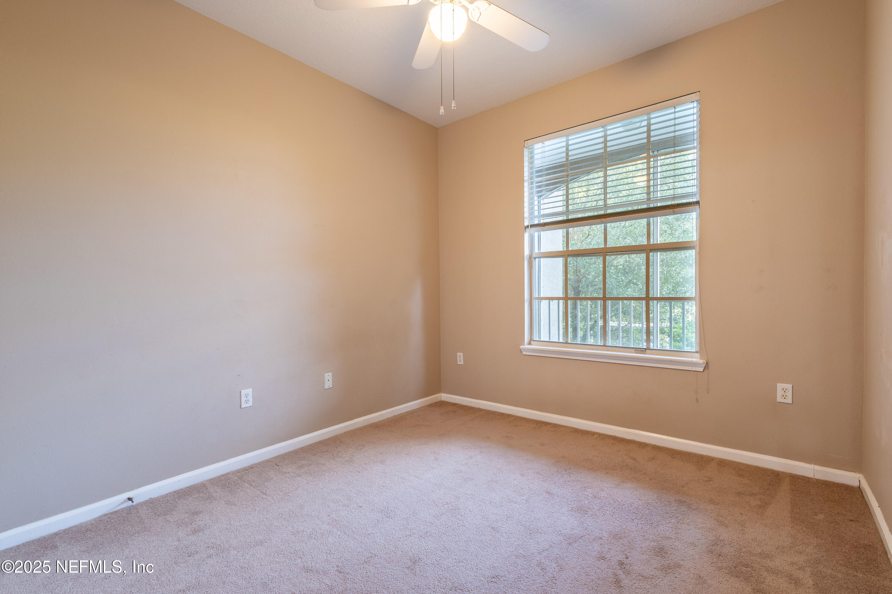 10550 Baymeadows Road, Unit 610 Jacksonville, FL 32256 - Photo 20 of 35 an empty room with a window
