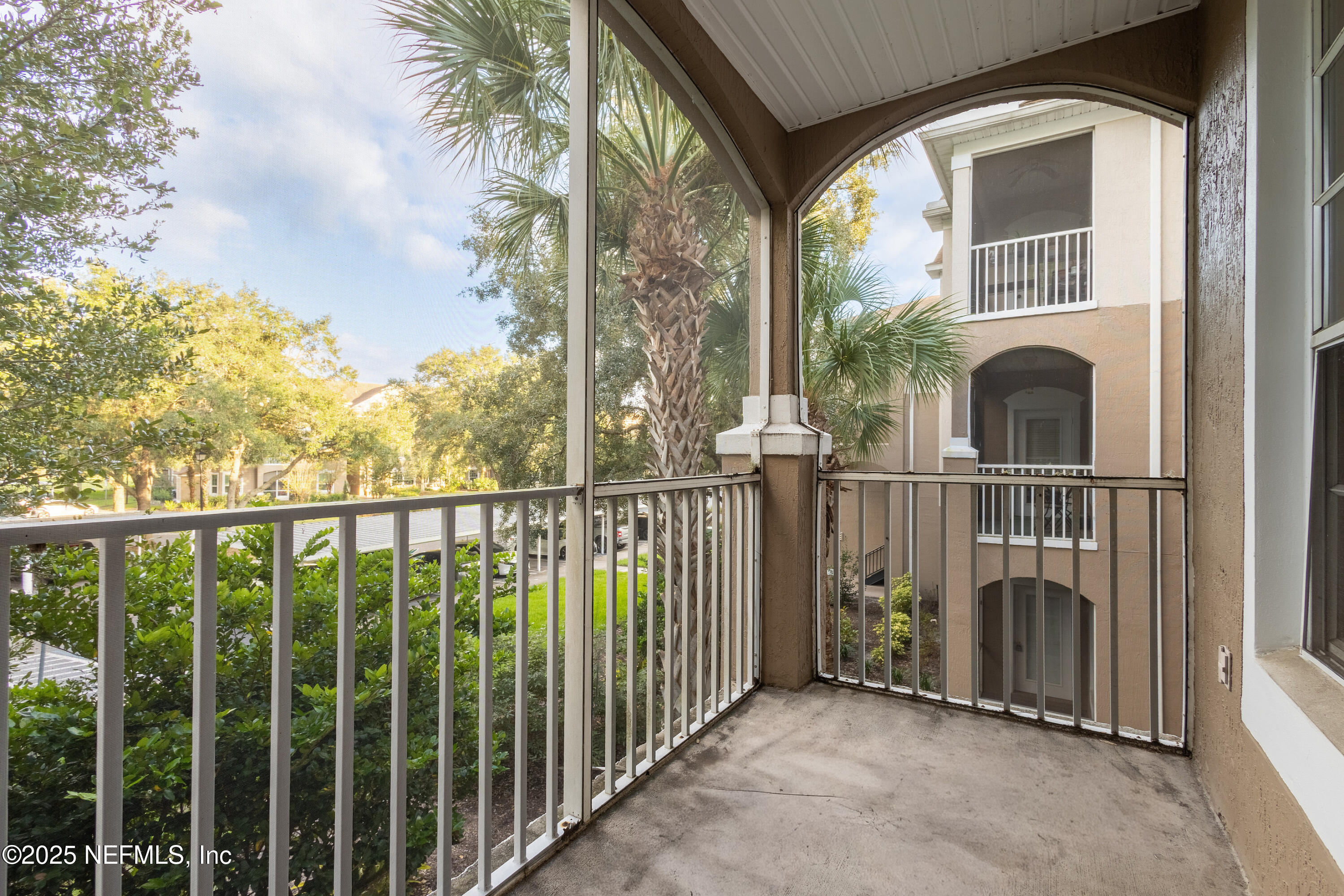 10550 Baymeadows Road, Unit 610 Jacksonville, FL 32256 - Photo 27 of 35 a view of a balcony with iron fence