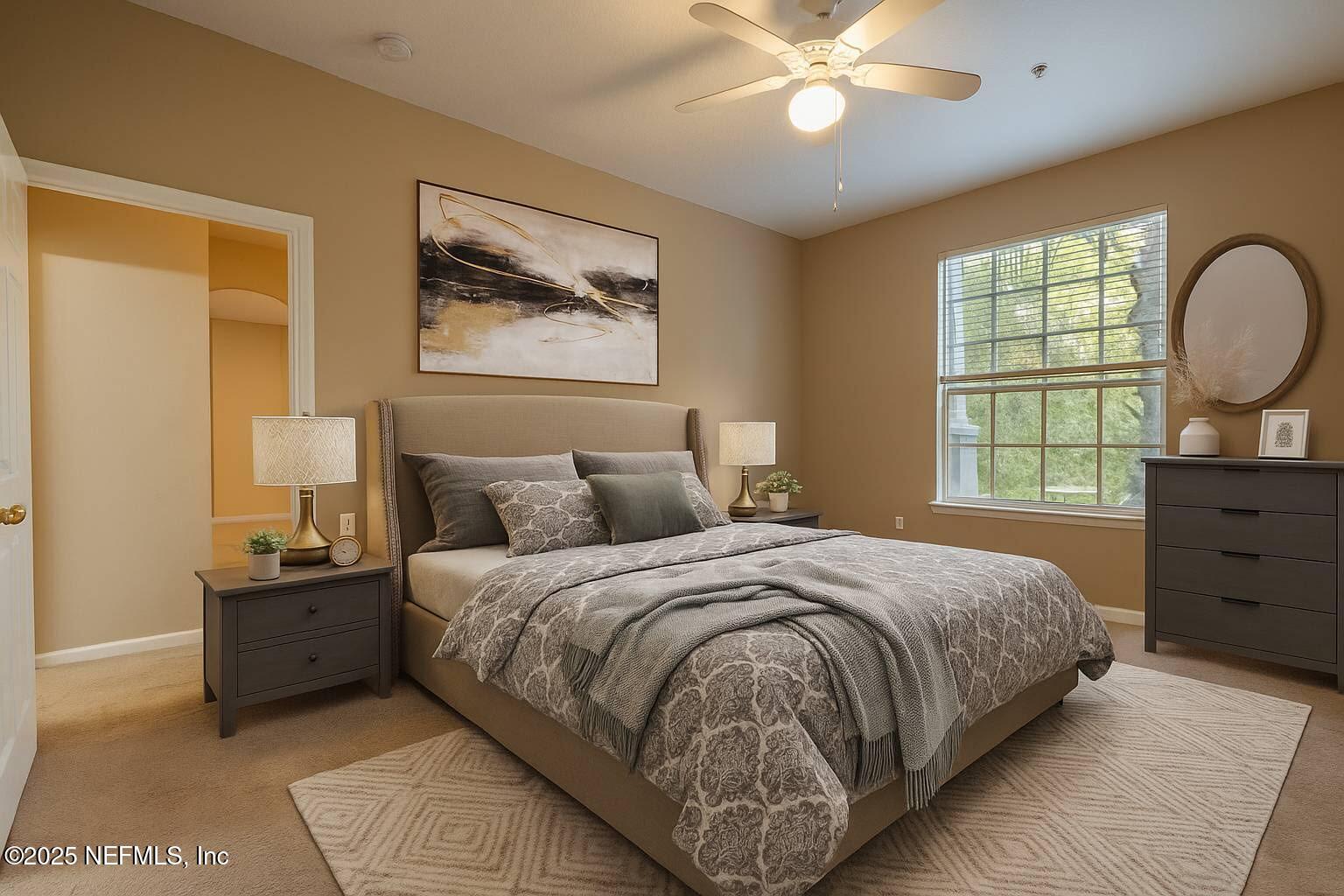 10550 Baymeadows Road, Unit 610 Jacksonville, FL 32256 - Photo 4 of 35 a bedroom with a bed and a window