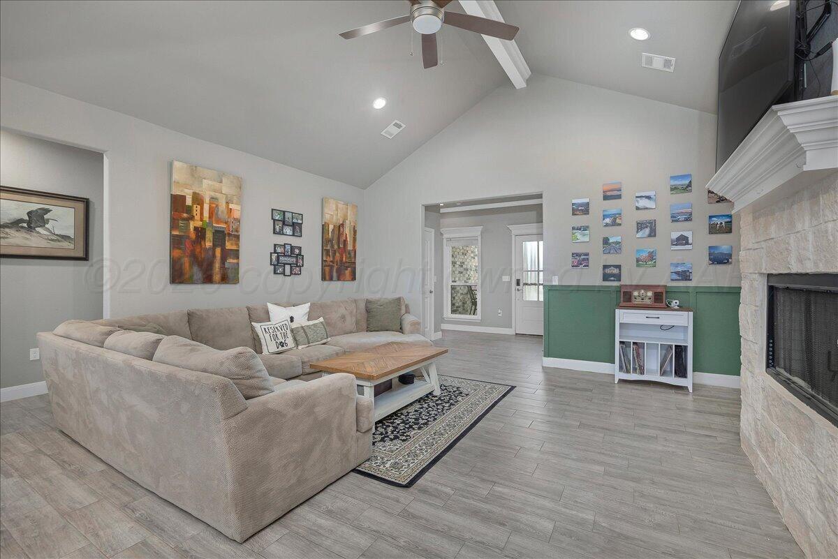 39 Cm Lane Canyon, TX 79015 - Photo 5 of 26 a living room with furniture and a fireplace
