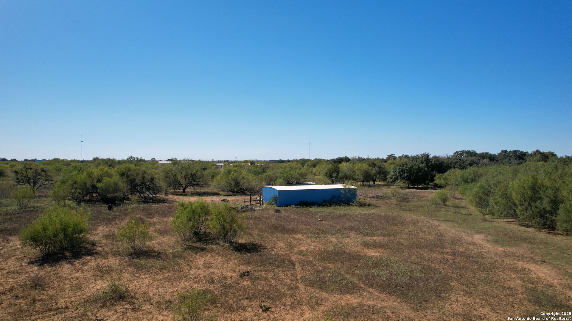 2452 2nd Street Pleasanton, TX 78064 - Photo 5 of 15 a view of a lake with trees in the background